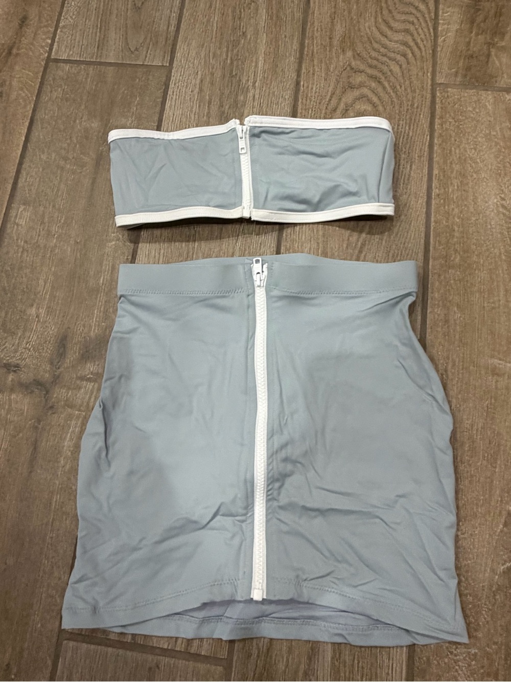 SKIMS Sporty Zipper Swim Mini Skirt set in the Pacific colorway XS